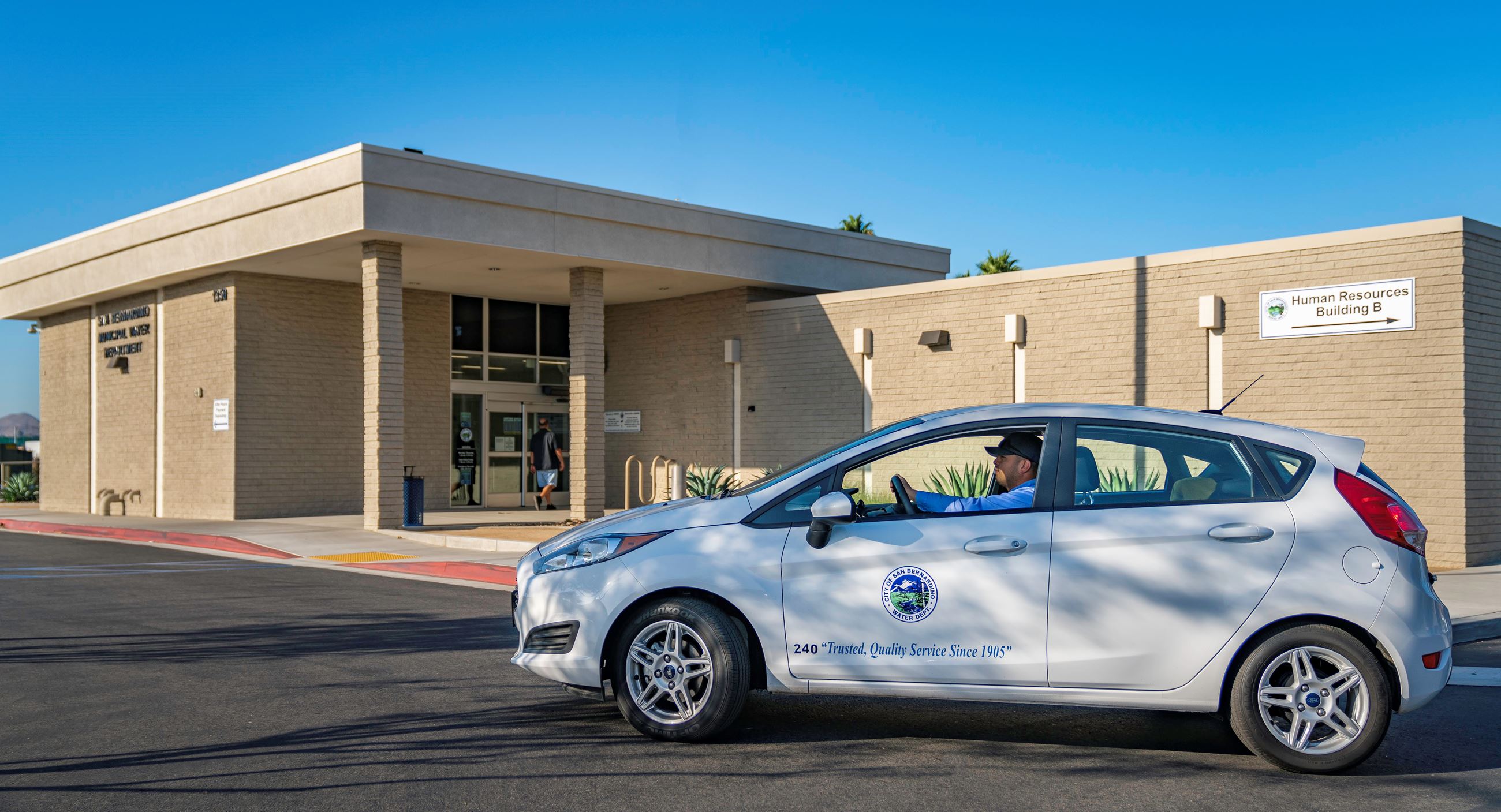 Car in front of customer service building
